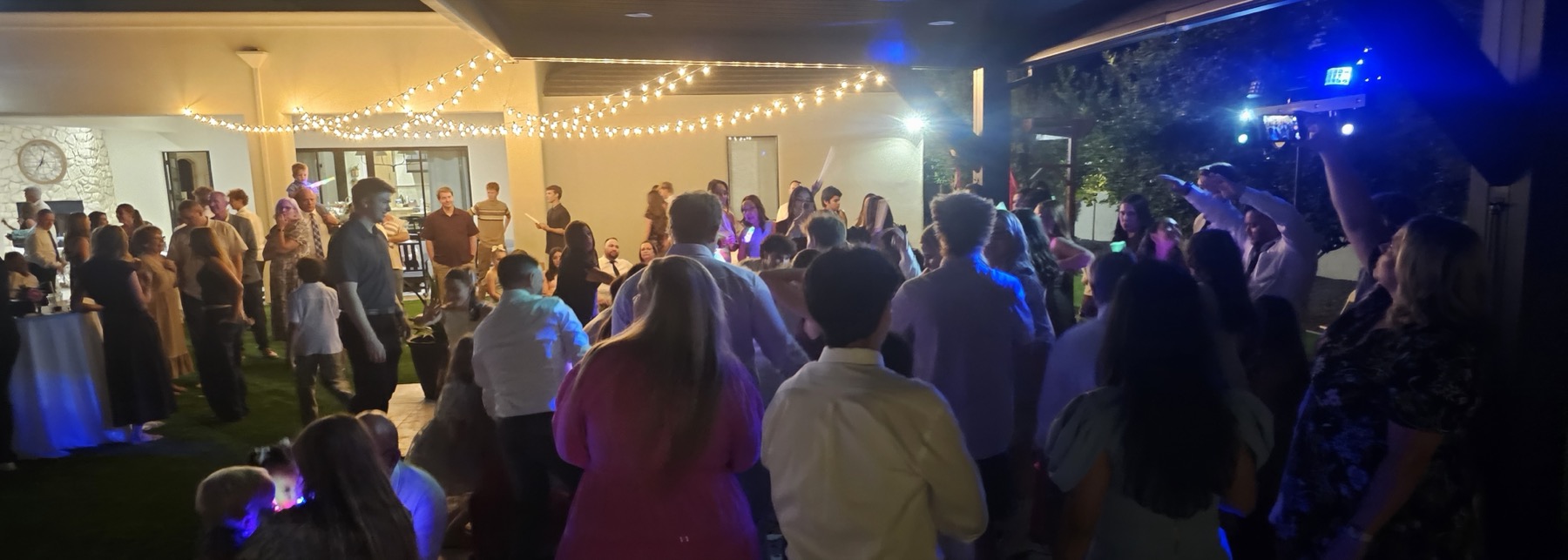 Packed outdoor dance floor at a Mesa Sound event