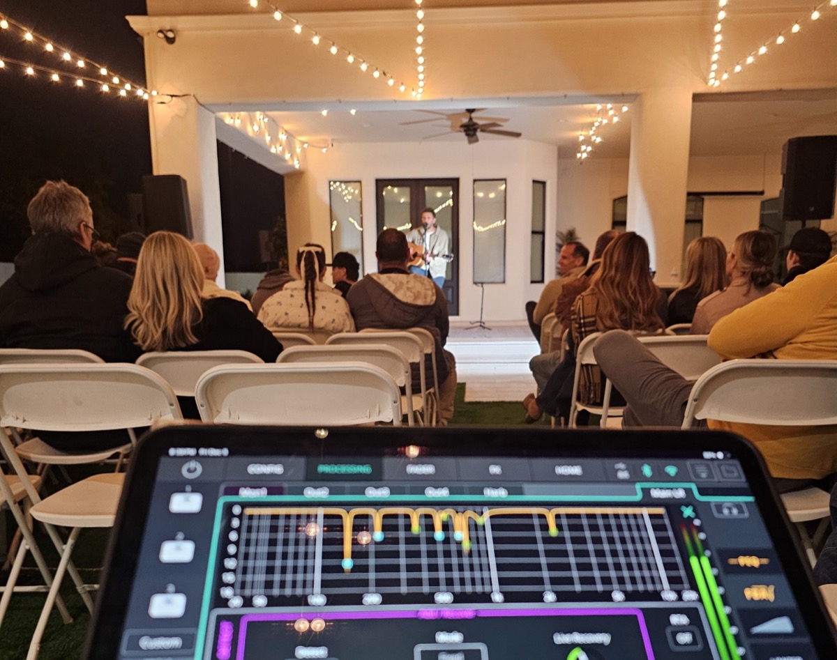 iPad running Allen & Heath CQ mixing software during a live performance